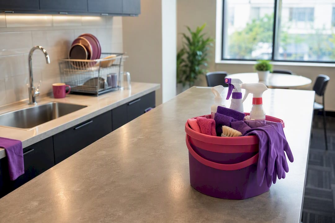 Cleaning supplies organized in office kitchen